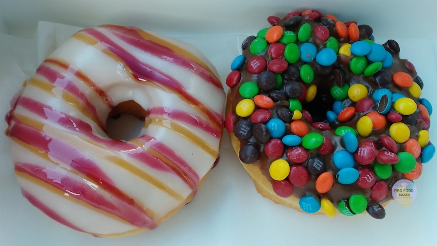 Raspberry Love donut and M&M donut from Glazed