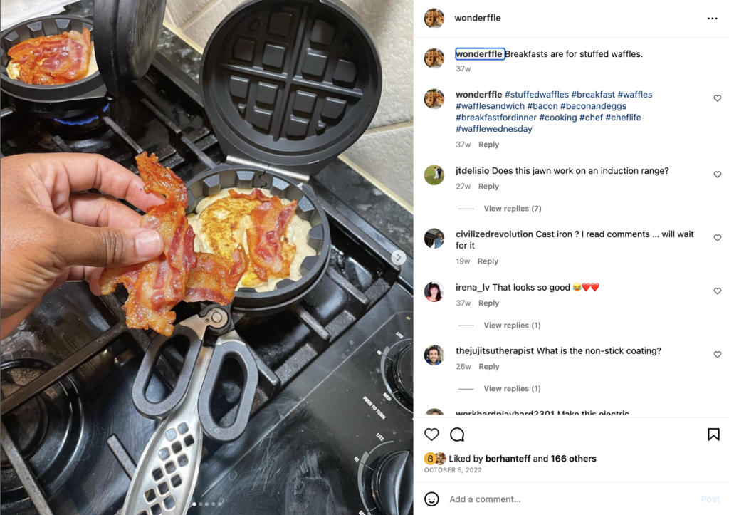 Inside view of the Wonderffle stuffed waffle maker. Bacon & eggs are inside the waffle iron on the stove top. Black inventor Mike Bradford.