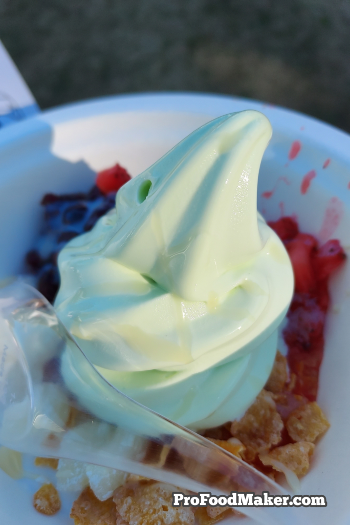 Melon soft serve with mochi, red bean, strawberries, condensed milk & Frosted Flakes