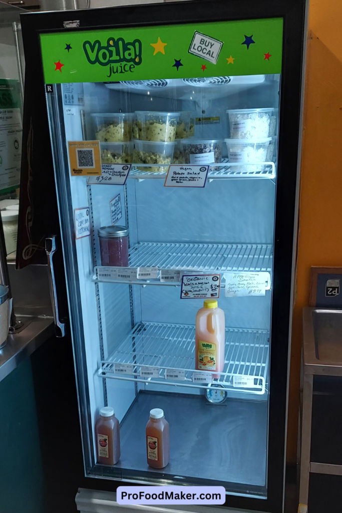 Mandela prepared foods in the fridge in the kitchen area.