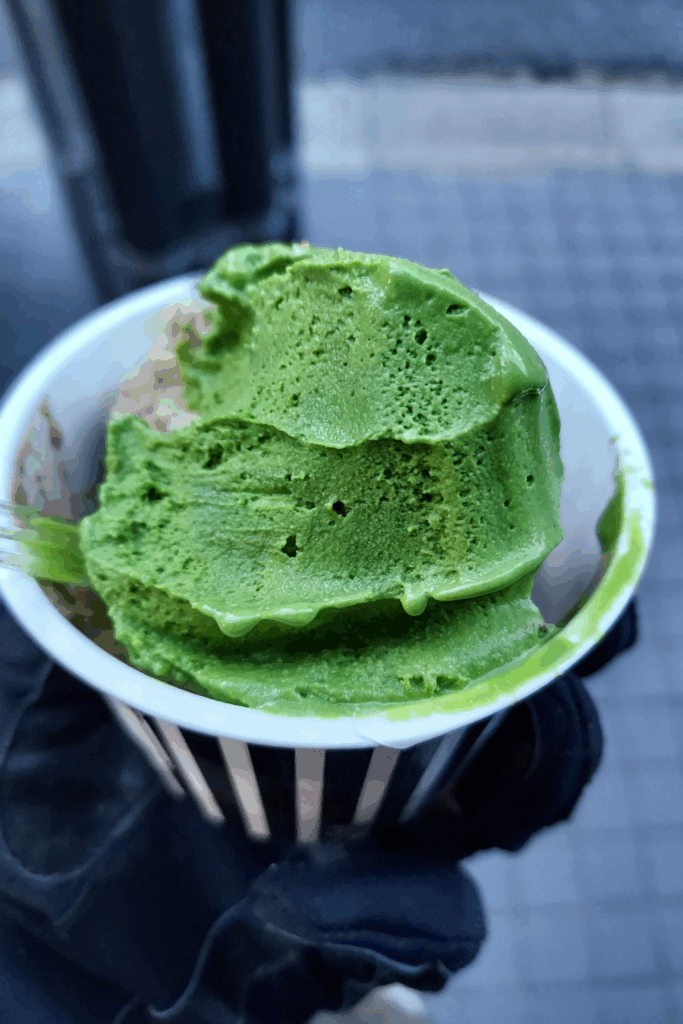 green tea ice cream in a cup