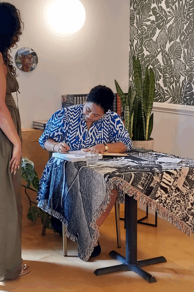 Food writer, Anela Malik signs her cookbook