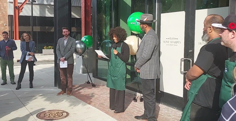 Cherisse Byers gives a speech at the grand opening ceremony.
