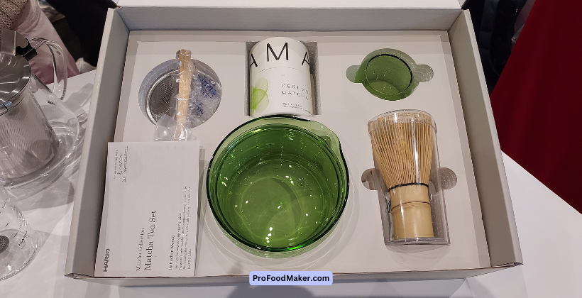 Hario matcha tea set with ceremonial grade tea a scoop, chasen (whisk) and more in a white gift box.