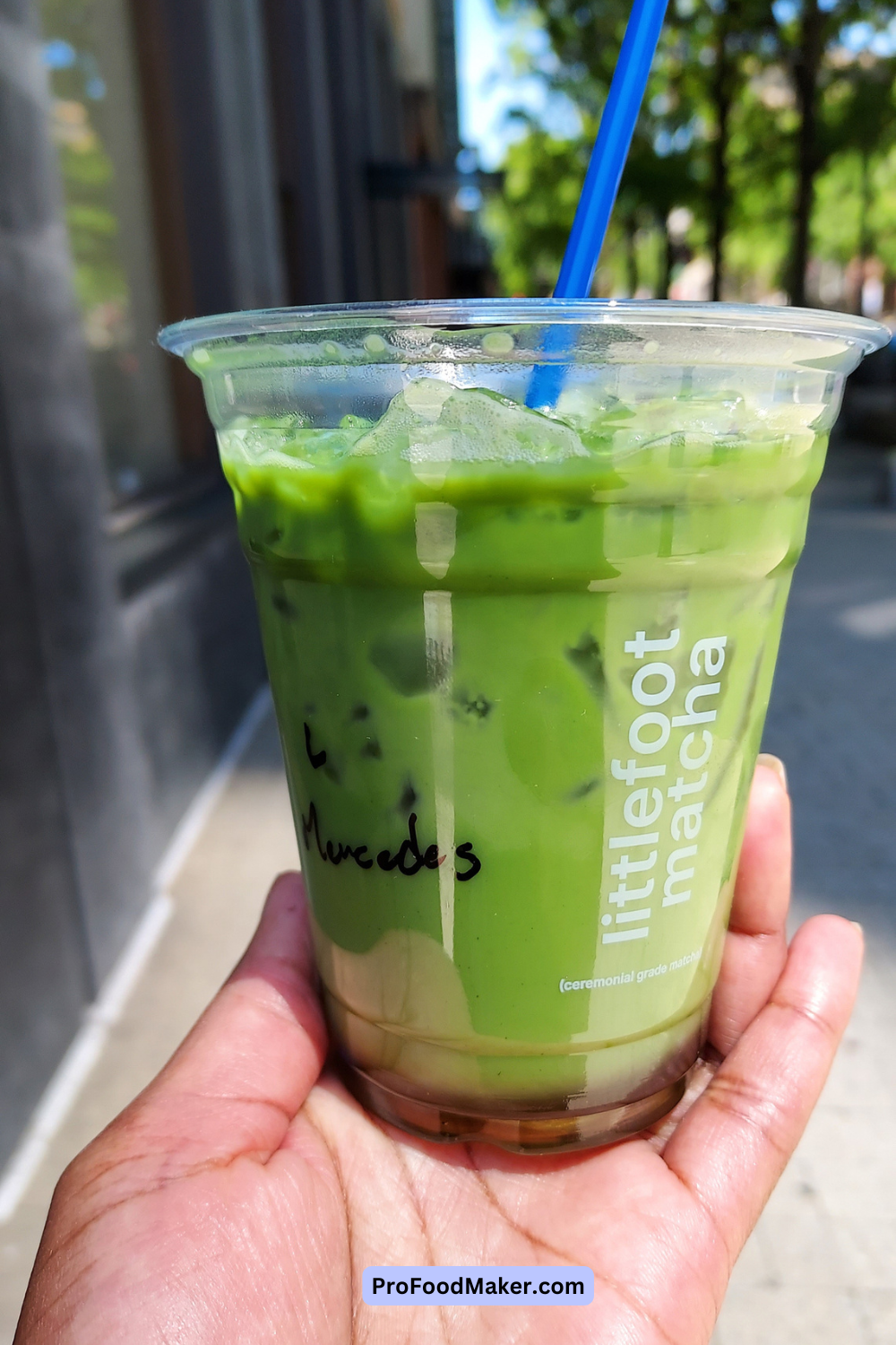 little foot matcha with a blue straw