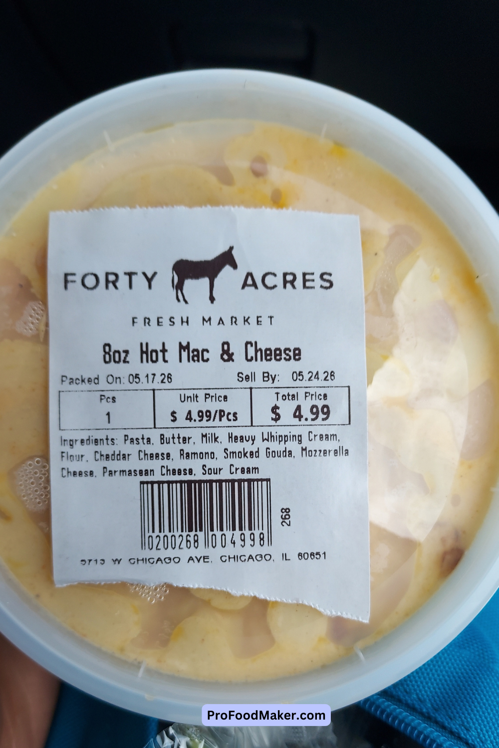 smoked gouda mac and cheese in an 8 oz plastic container with a white label