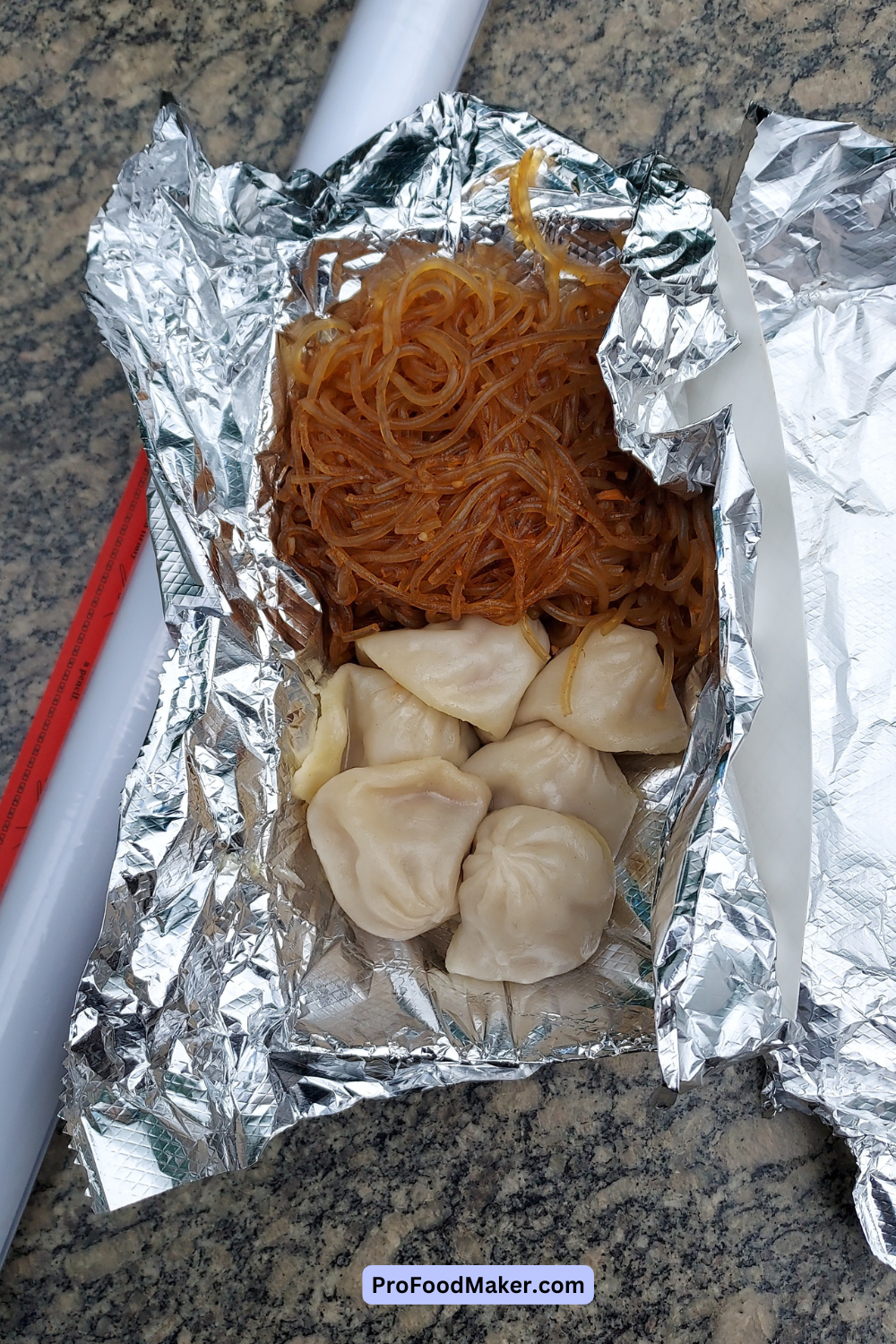 chirba chirba dumpling truck food next to my poster and takeout chopsticks