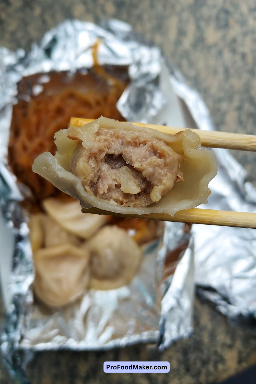 dumpling and glass noodles from chirba chirba. this is a close up shot of the inside of the jiaozi