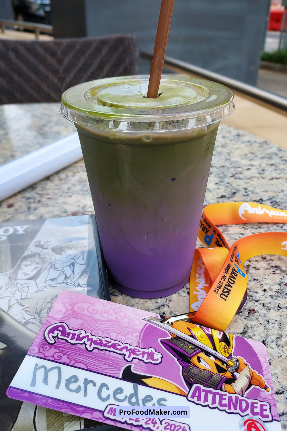 iced ube matcha next to animazement badge