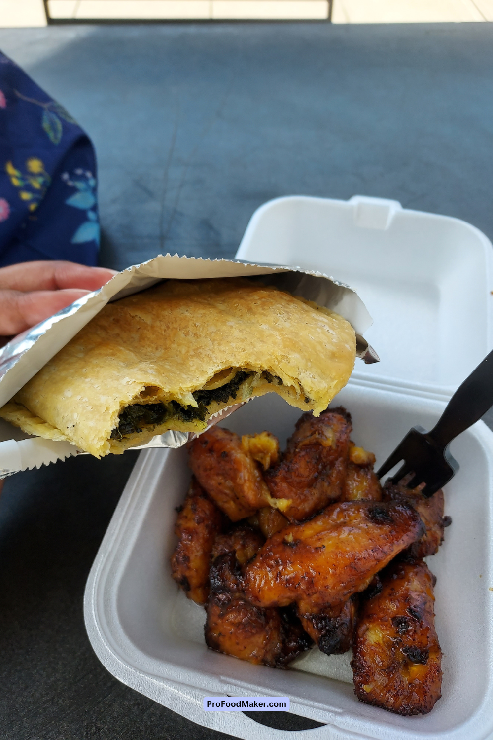 spinach patty in foil and a side order of plantain in a small plastic container from Lee's Kitchen